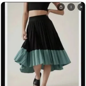 Athleta high low skirt. Never worn. NWOT .  Size large .