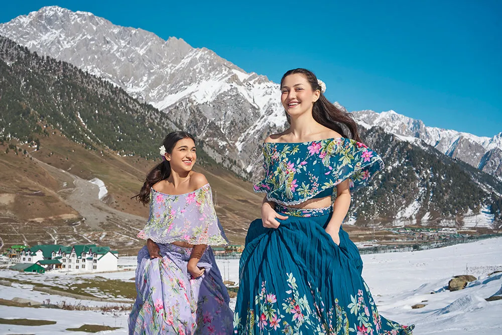 navy blue floral hand emdroiderd off sholulder cape blouse with pleated lehanga made in georgette fabric